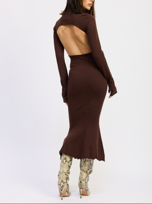 Woman wearing a brown long-sleeve dress with cut-out back on a white background